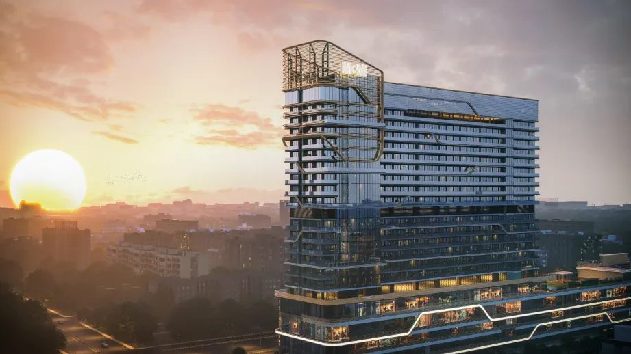 Sunset skyline view of M3M 72 commercial tower